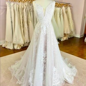 Private label wedding gown. Never worn or altered size 10